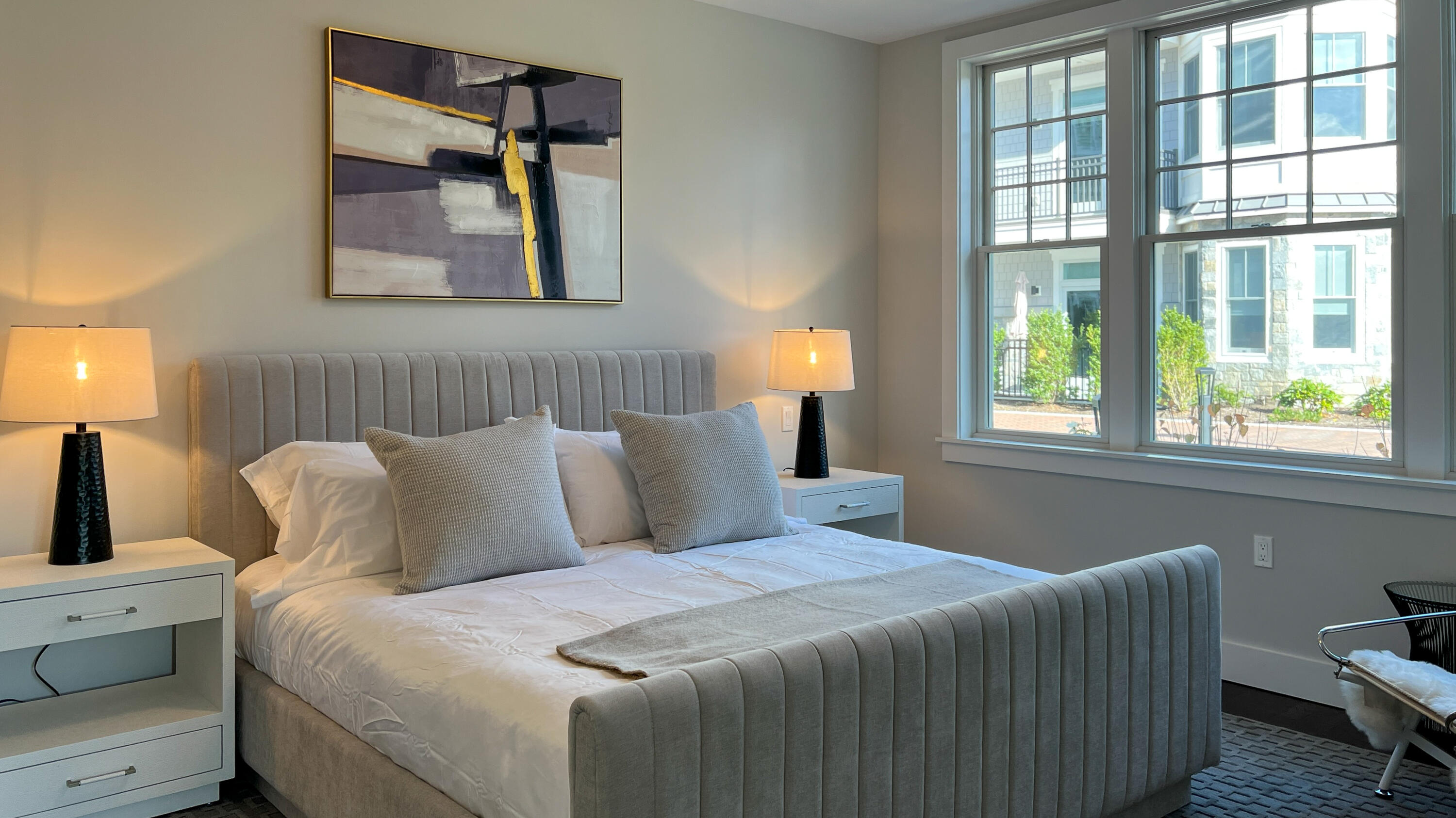 180 Park Street, Unit 204 New Canaan, CT 06840 - Photo 16 of 31 a bedroom with a bed and window