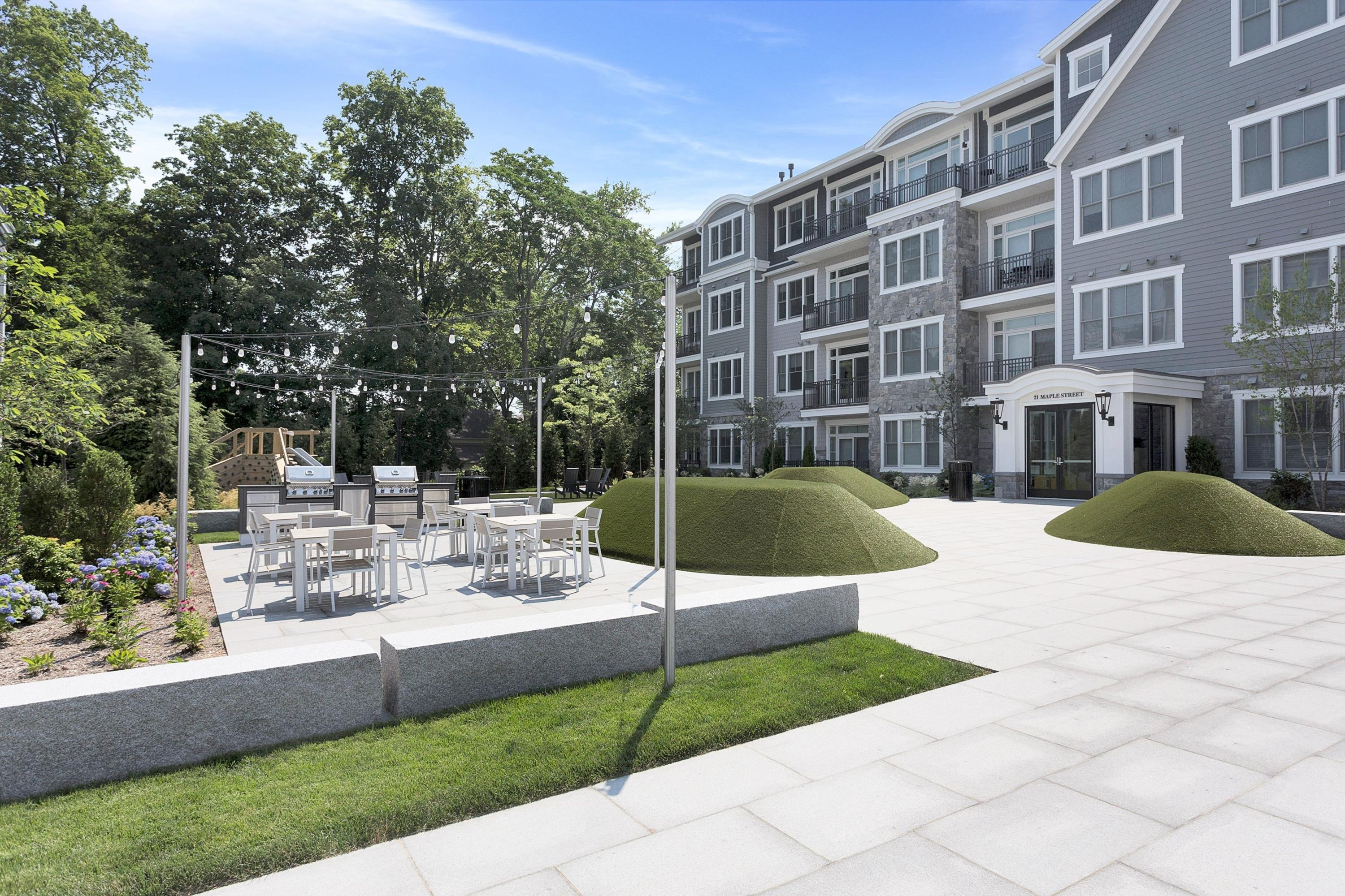 180 Park Street, Unit 204 New Canaan, CT 06840 - Photo 19 of 31 a view of pool with a patio