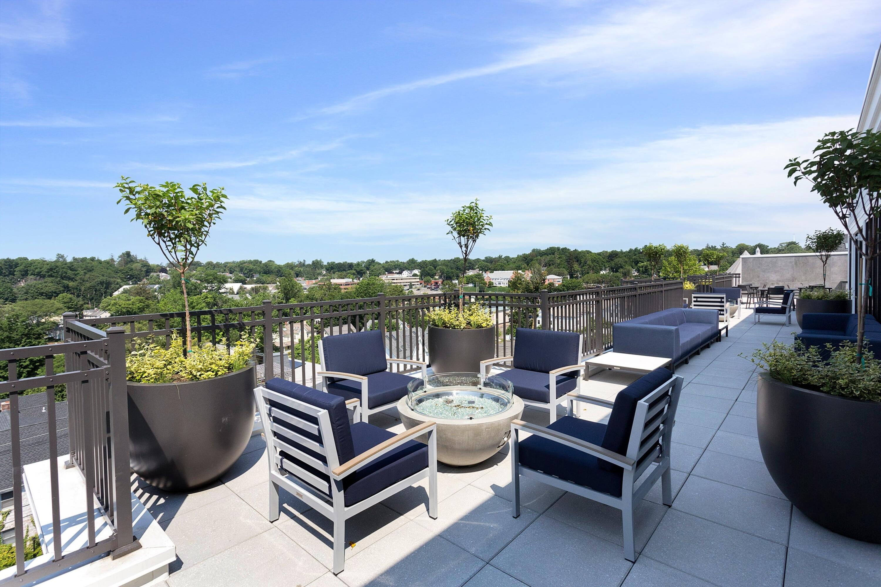 180 Park Street, Unit 204 New Canaan, CT 06840 - Photo 25 of 31 a view of a terrace with furniture