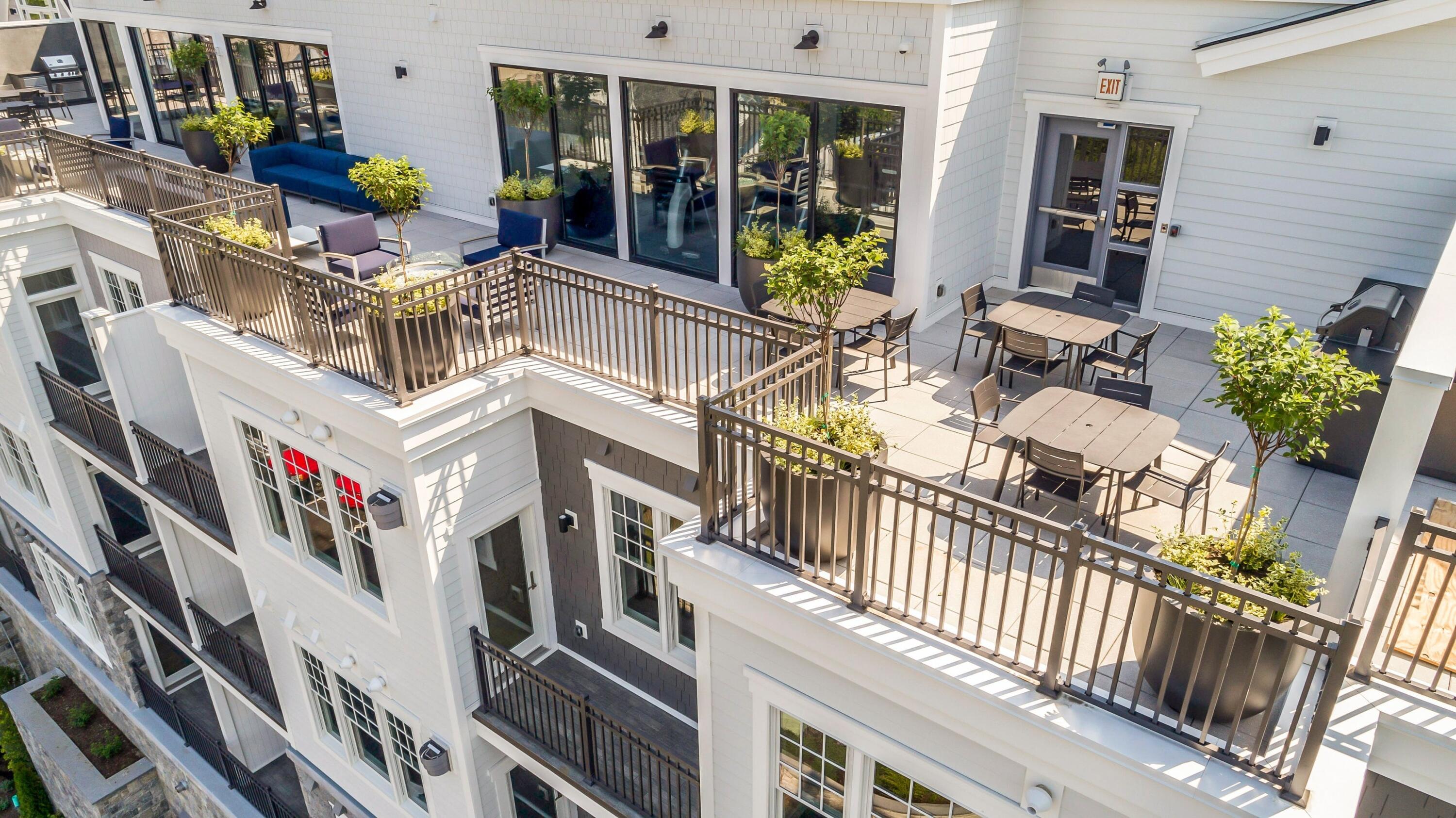 180 Park Street, Unit 204 New Canaan, CT 06840 - Photo 29 of 31 a view of buildings from the balcony