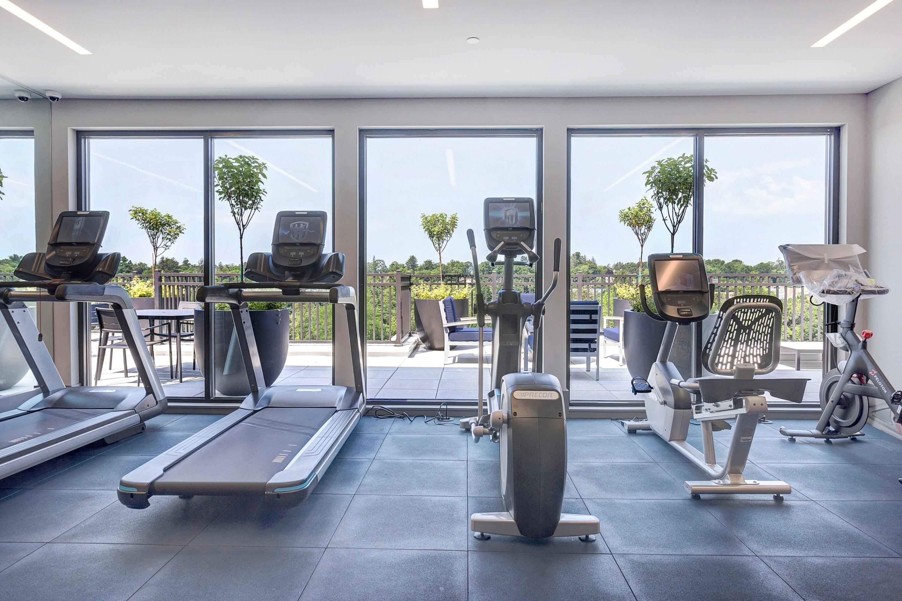 180 Park Street, Unit 204 New Canaan, CT 06840 - Photo 30 of 31 a view of a room with gym equipment