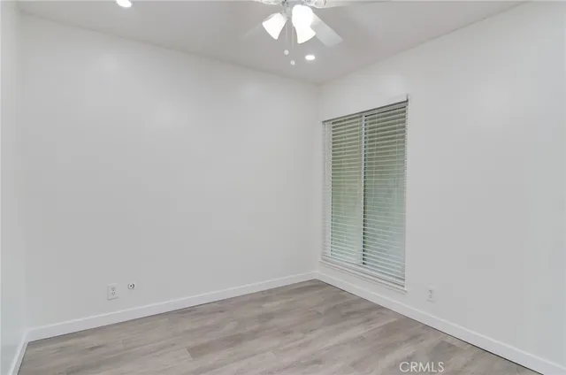 a front view of a house with a yard table and chairs