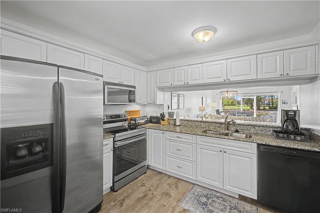 7065 Dennis Circle, Unit F103 Naples, FL 34104 - Photo 4 of 32
