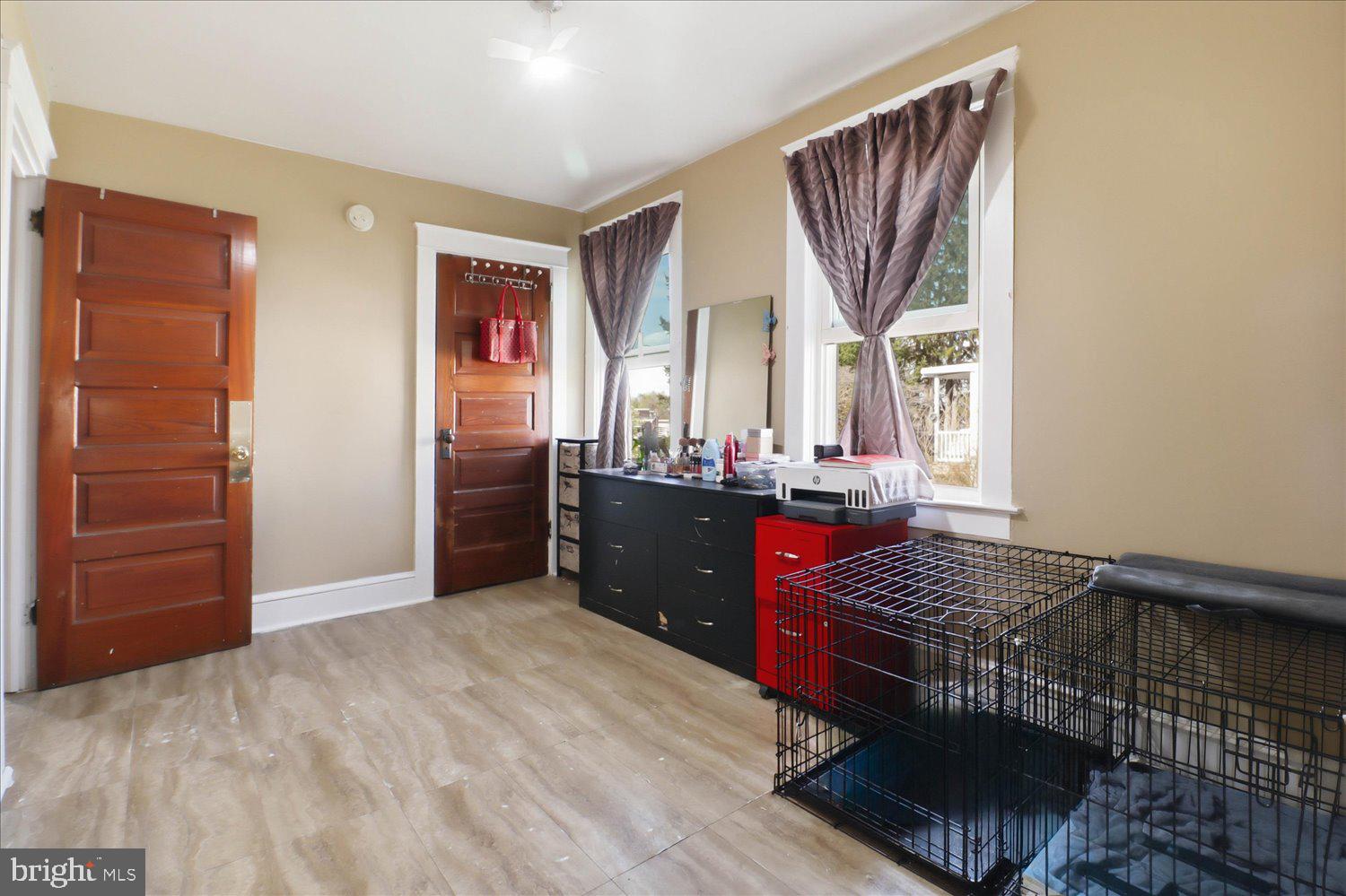 875 Manor Street Lancaster, PA 17603 - Photo 25 of 54 a bedroom with a bed and wooden floor
