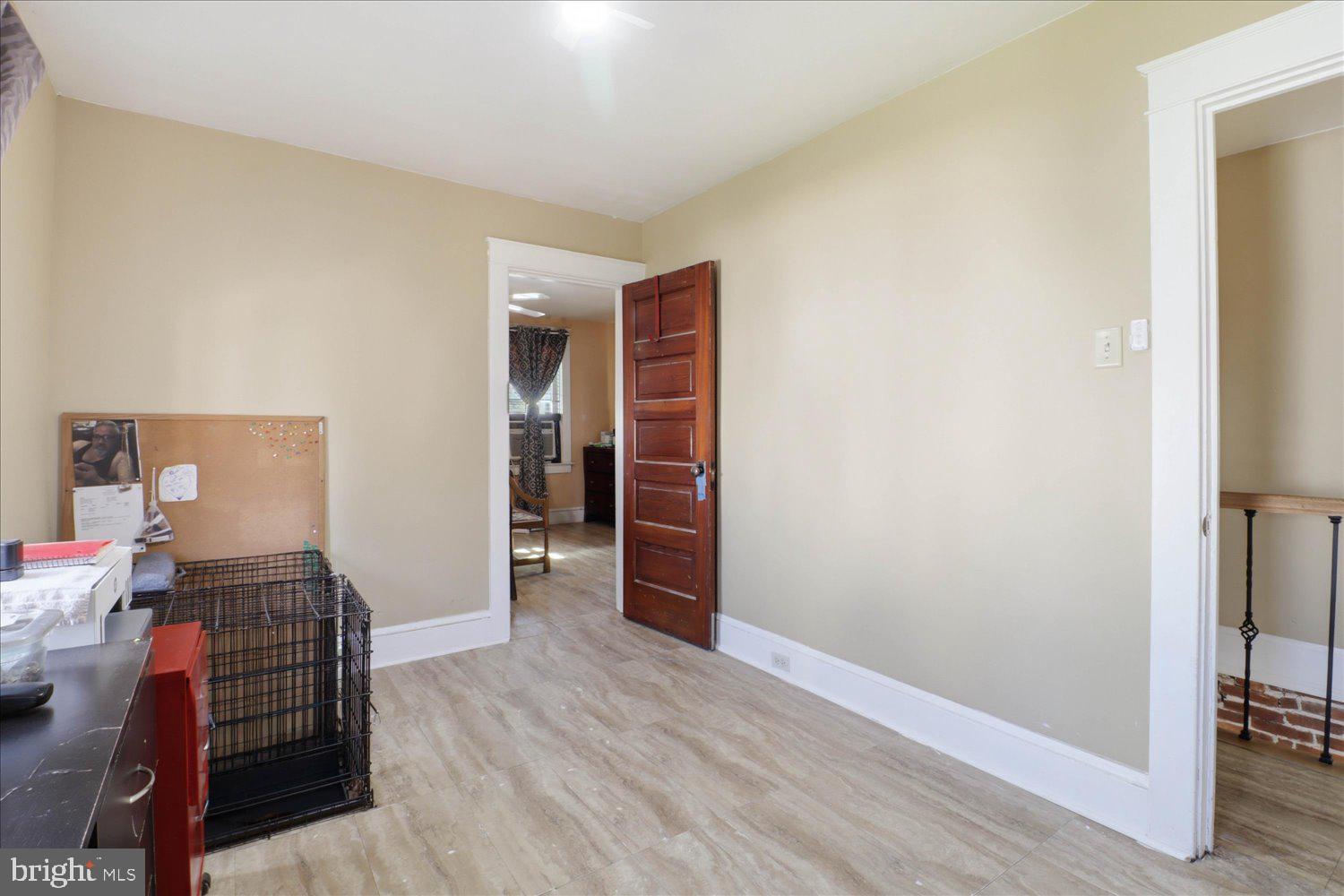 875 Manor Street Lancaster, PA 17603 - Photo 26 of 54 a view of a hallway with wooden floor and closet