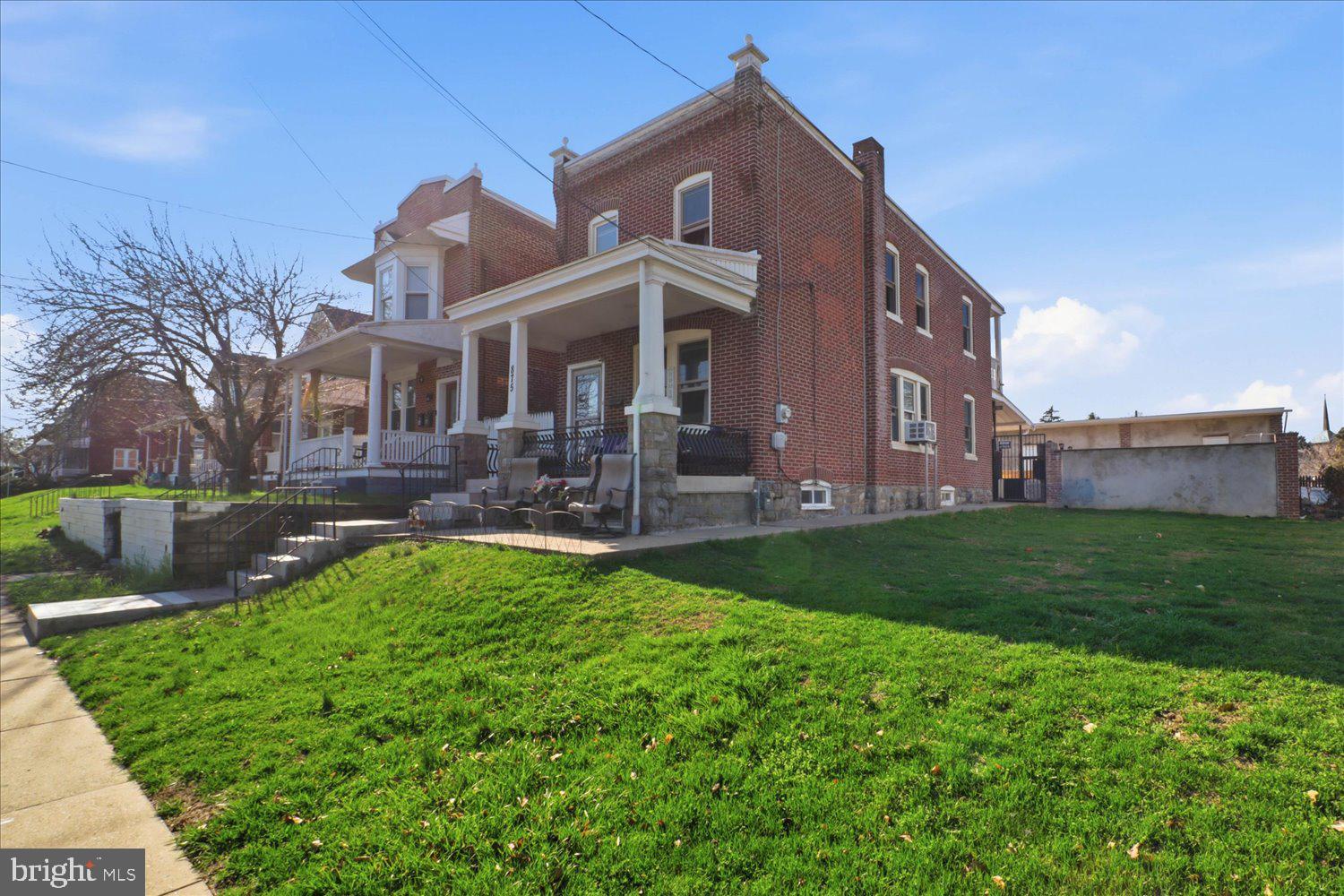 875 Manor Street Lancaster, PA 17603 - Photo 3 of 54 a front view of a house with garden