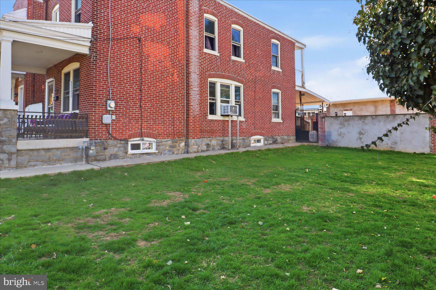 875 Manor Street Lancaster, PA 17603 - Photo 4 of 54 a front view of a house with a garden and plants