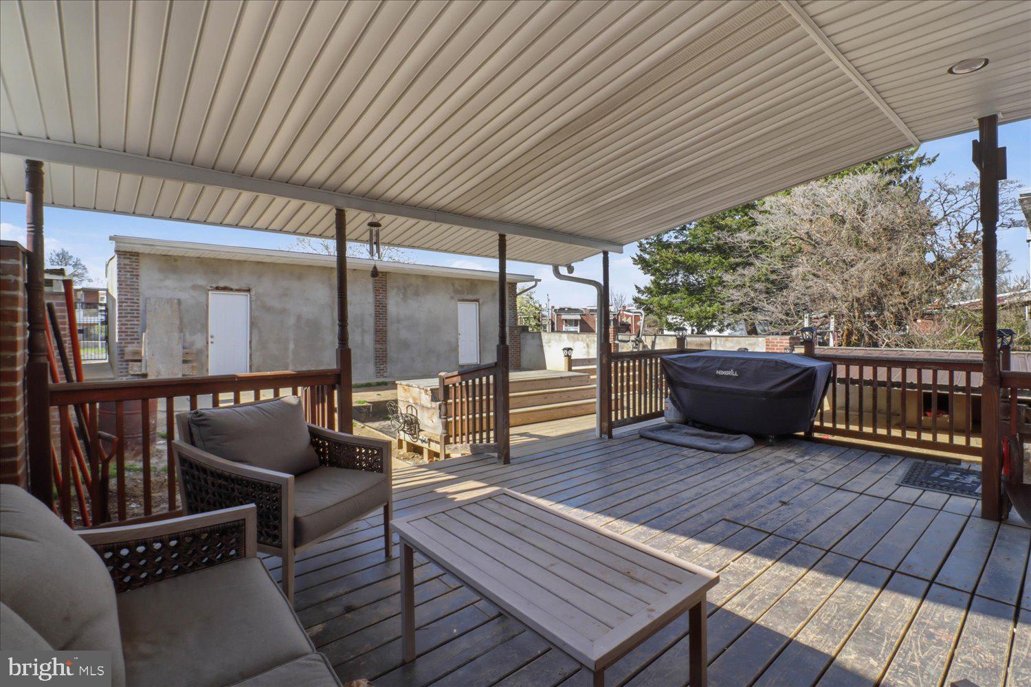 875 Manor Street Lancaster, PA 17603 - Photo 43 of 54 a balcony with wooden floor outdoor seating and wooden floors