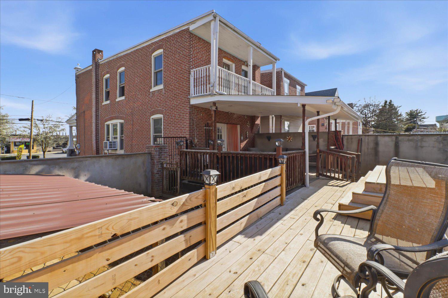 875 Manor Street Lancaster, PA 17603 - Photo 47 of 54 a view of a house with wooden deck