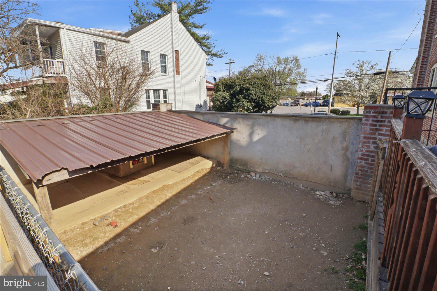 875 Manor Street Lancaster, PA 17603 - Photo 48 of 54 a view of a roof deck with wooden floor and fence