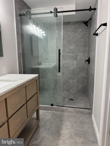 a view of a wooden deck with furniture