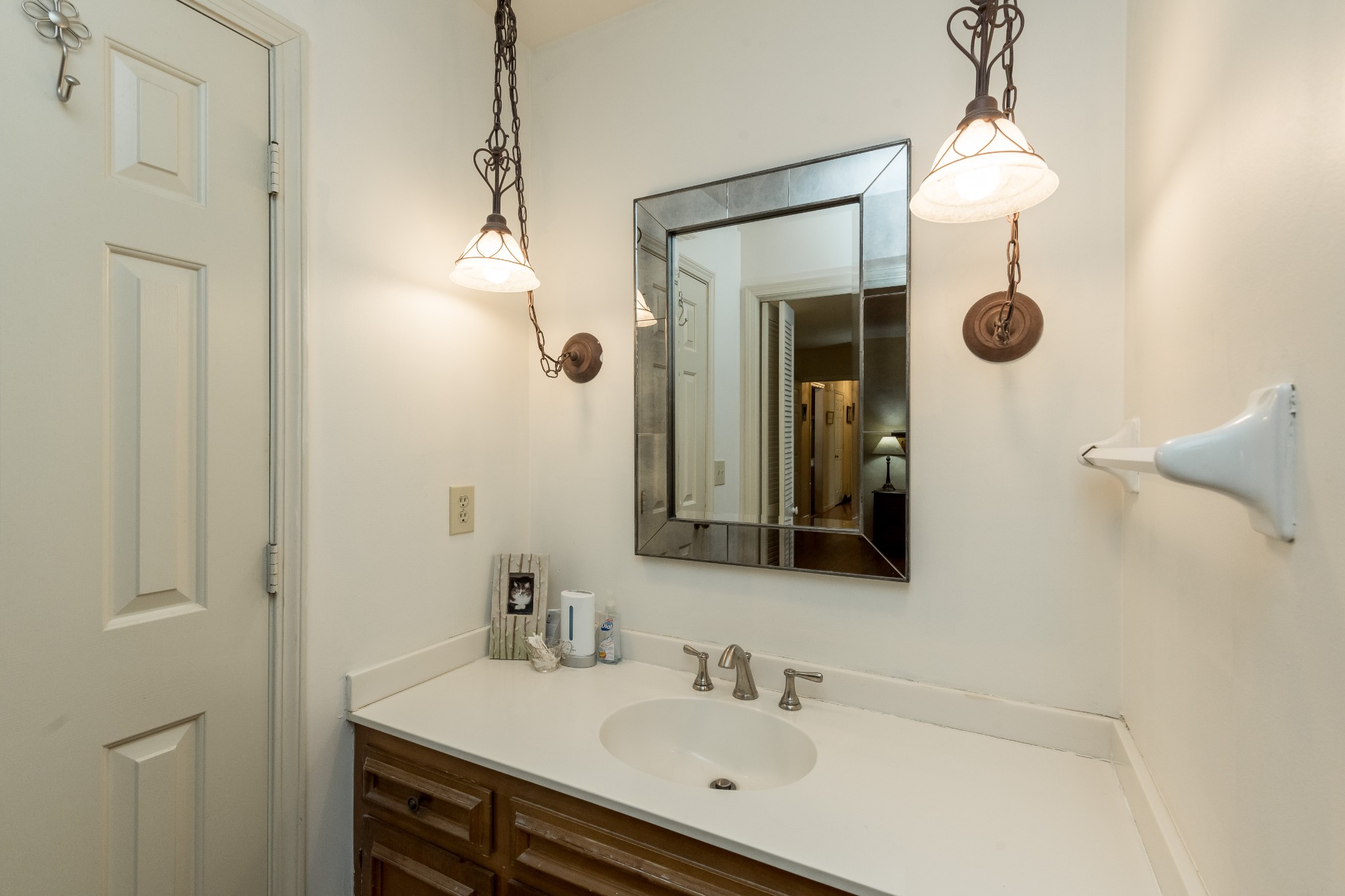 822 General George Patton Road Nashville, TN 37221 - Photo 11 of 16 a bathroom with a sink a mirror a vanity and shower