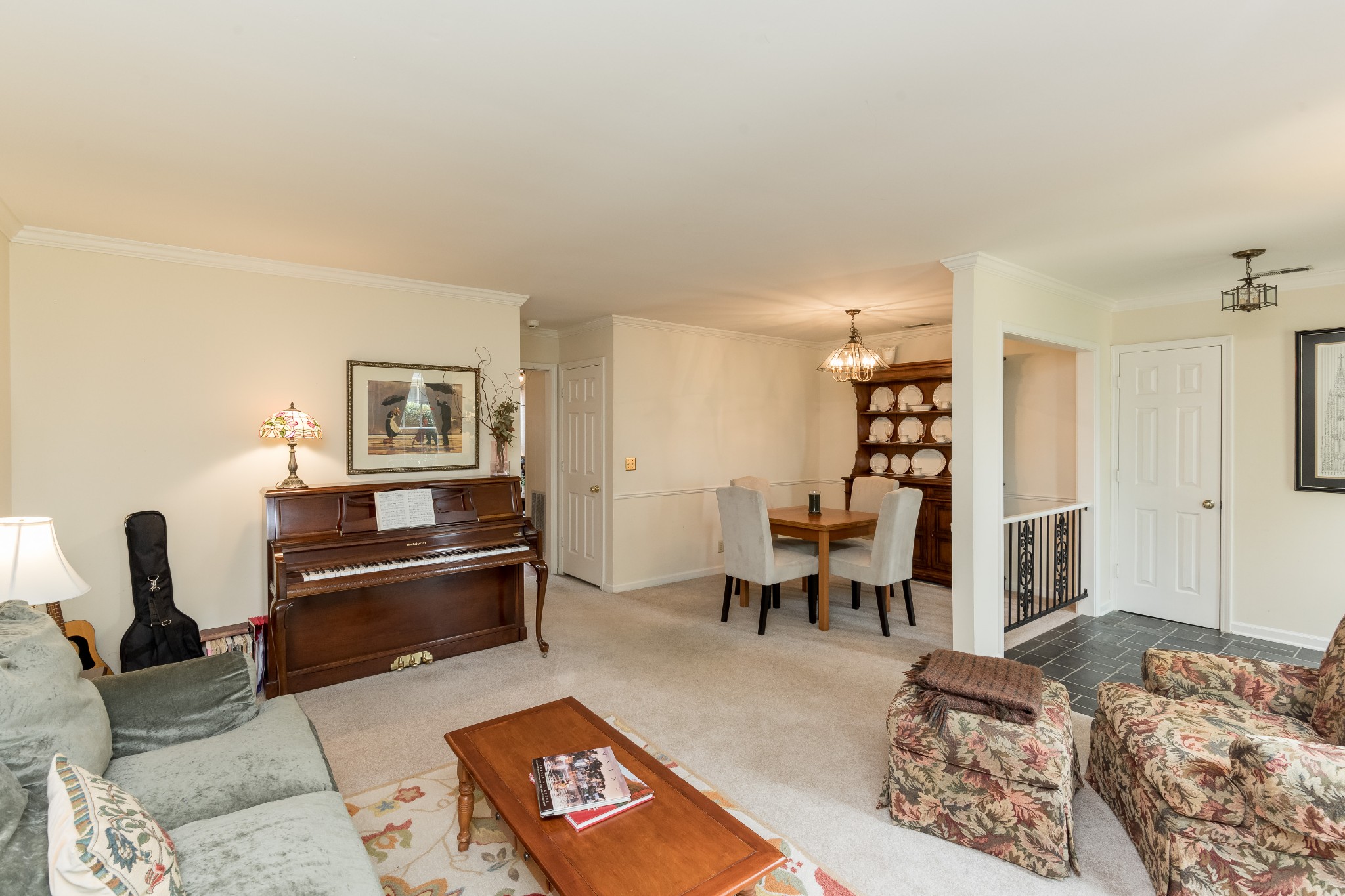 822 General George Patton Road Nashville, TN 37221 - Photo 4 of 16 a living room with furniture a flat screen tv and a table