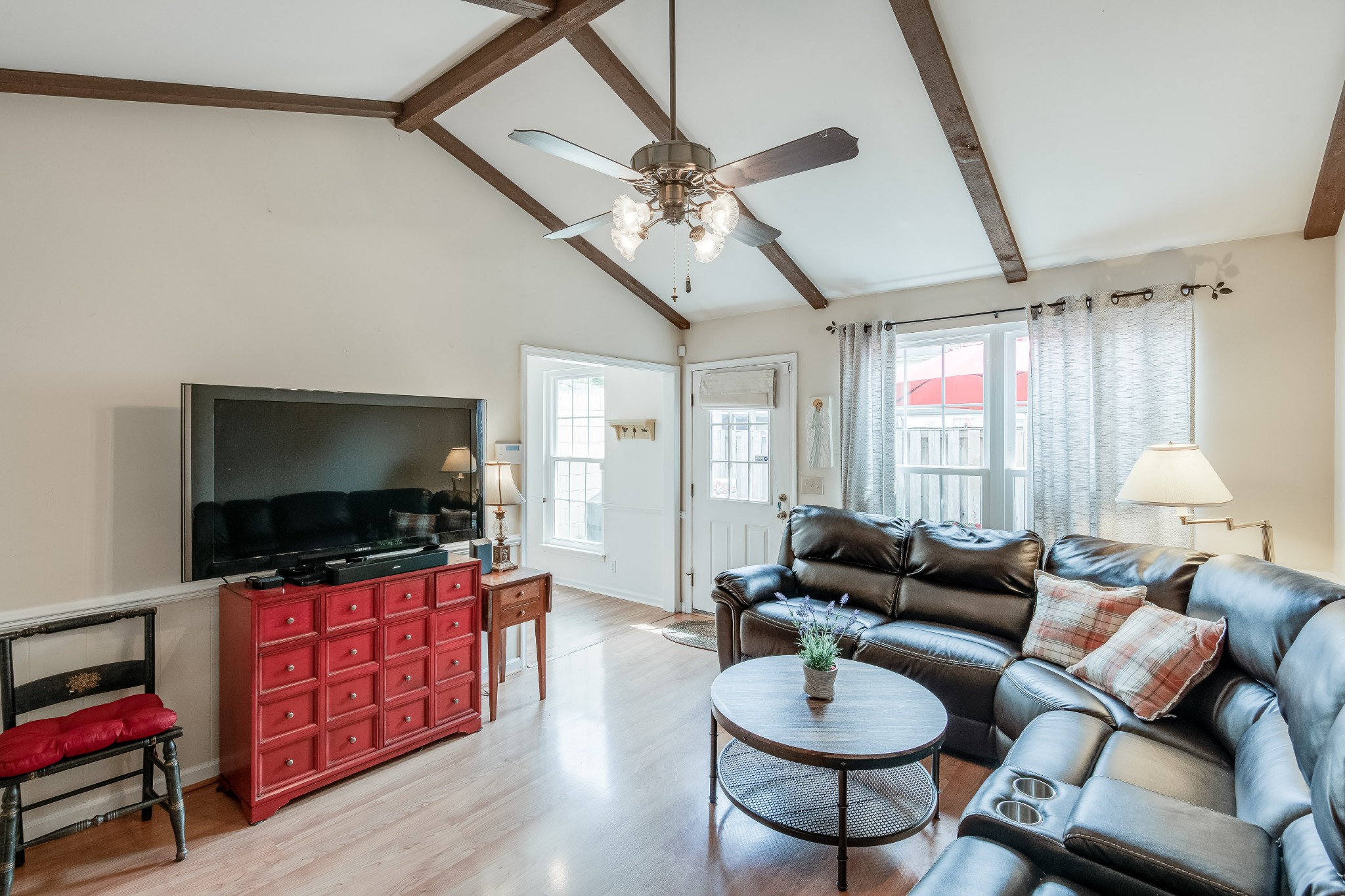 822 General George Patton Road Nashville, TN 37221 - Photo 9 of 16 a living room with furniture and a flat screen tv