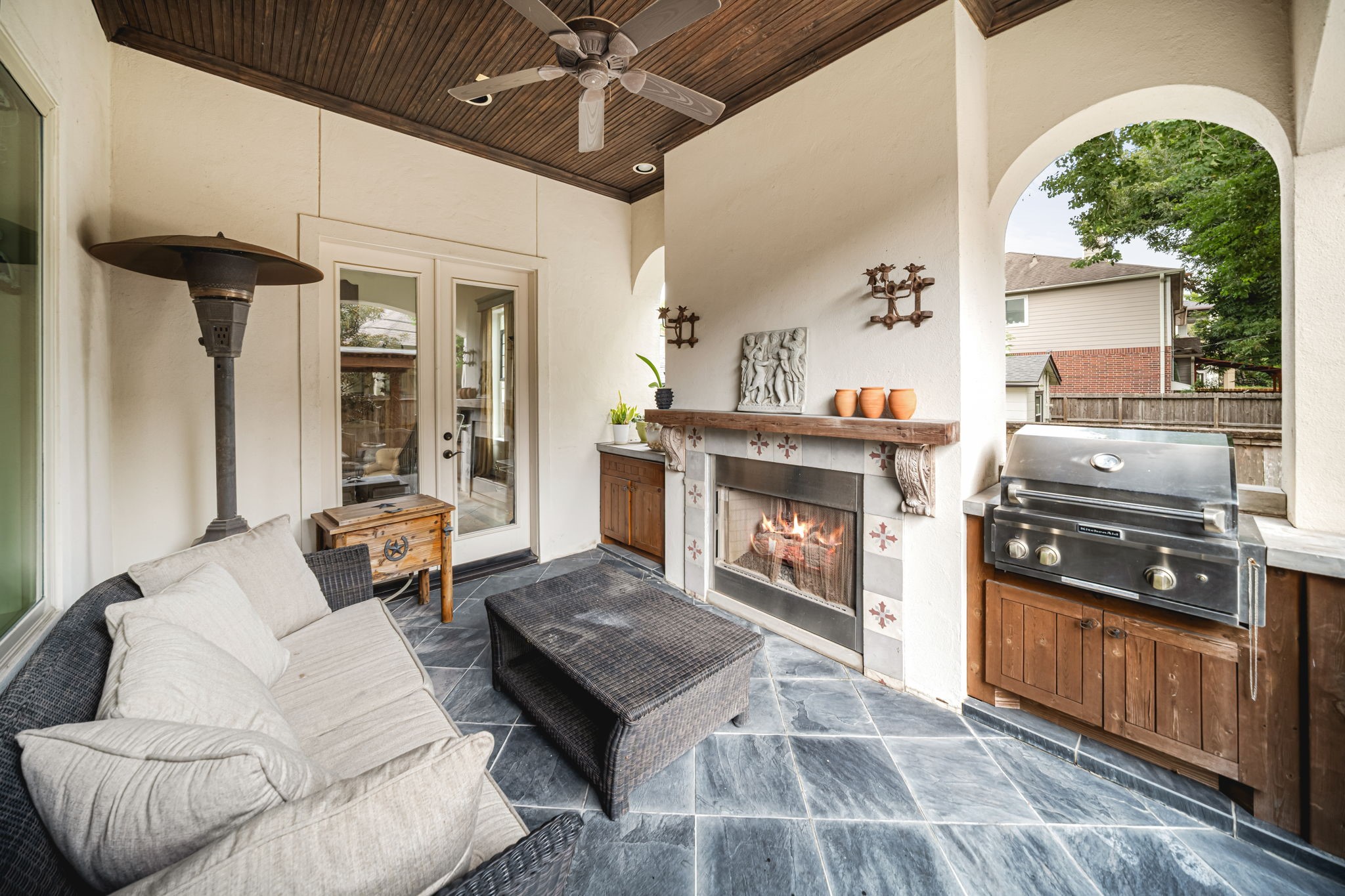 5529 Jessamine Street Houston, TX 77081 - Photo 33 of 37 a living room with furniture and a fireplace