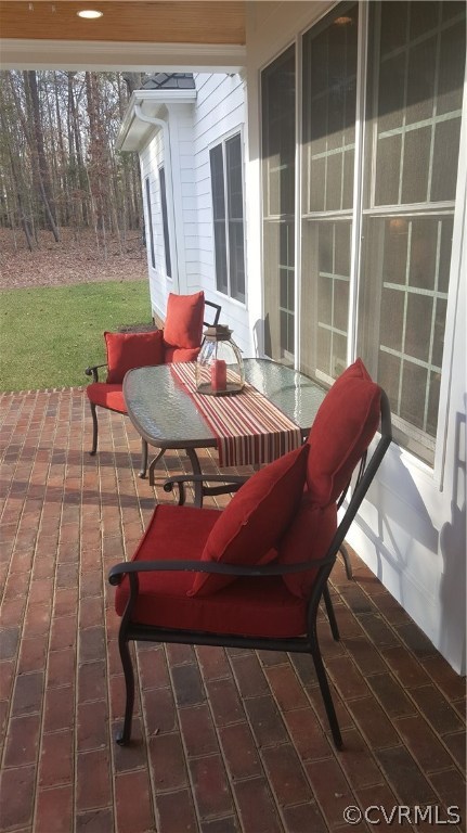 3042 Braehead Road Powhatan, VA 23139 - Photo 20 of 50 Covered back porch. A partial view with a patio be