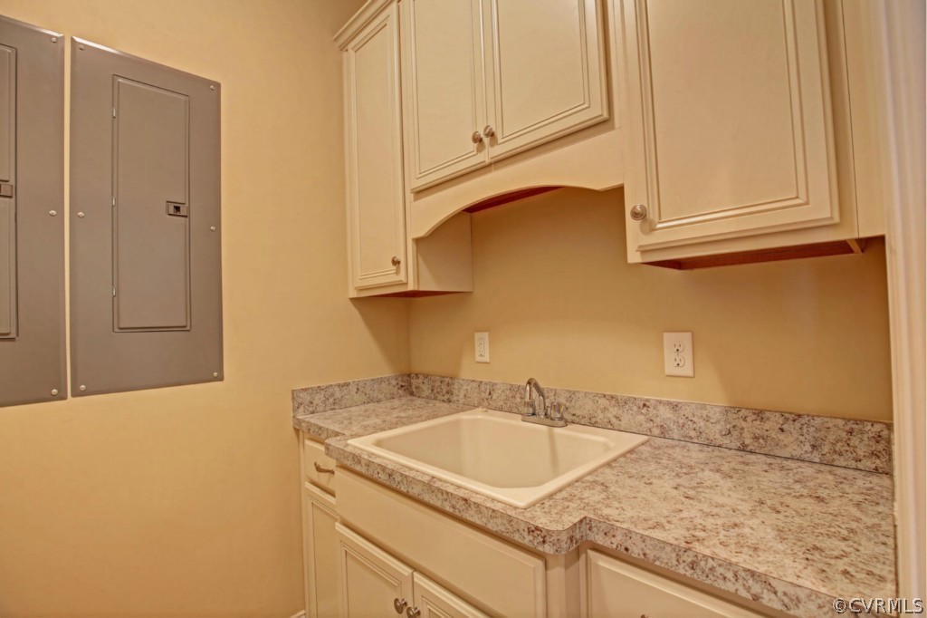 3042 Braehead Road Powhatan, VA 23139 - Photo 39 of 50 Laundry room has counter top and cabinets. Upstair