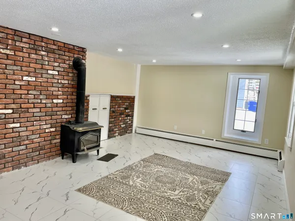 wooden floor with a rug