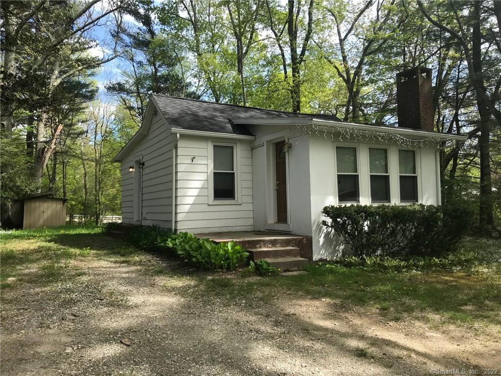 172 Snake Meadow Road Killingly, CT 06239 - Photo 1 of 1 a front view of a house with garden
