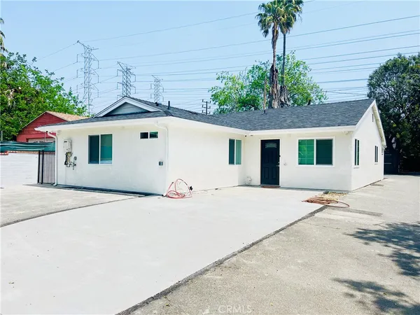 a front view of a house with a garage