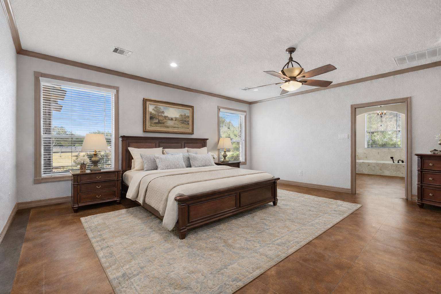 500 Burwell Road Highlands, TX 77562 - Photo 20 of 50 a spacious bedroom with a large bed and a window