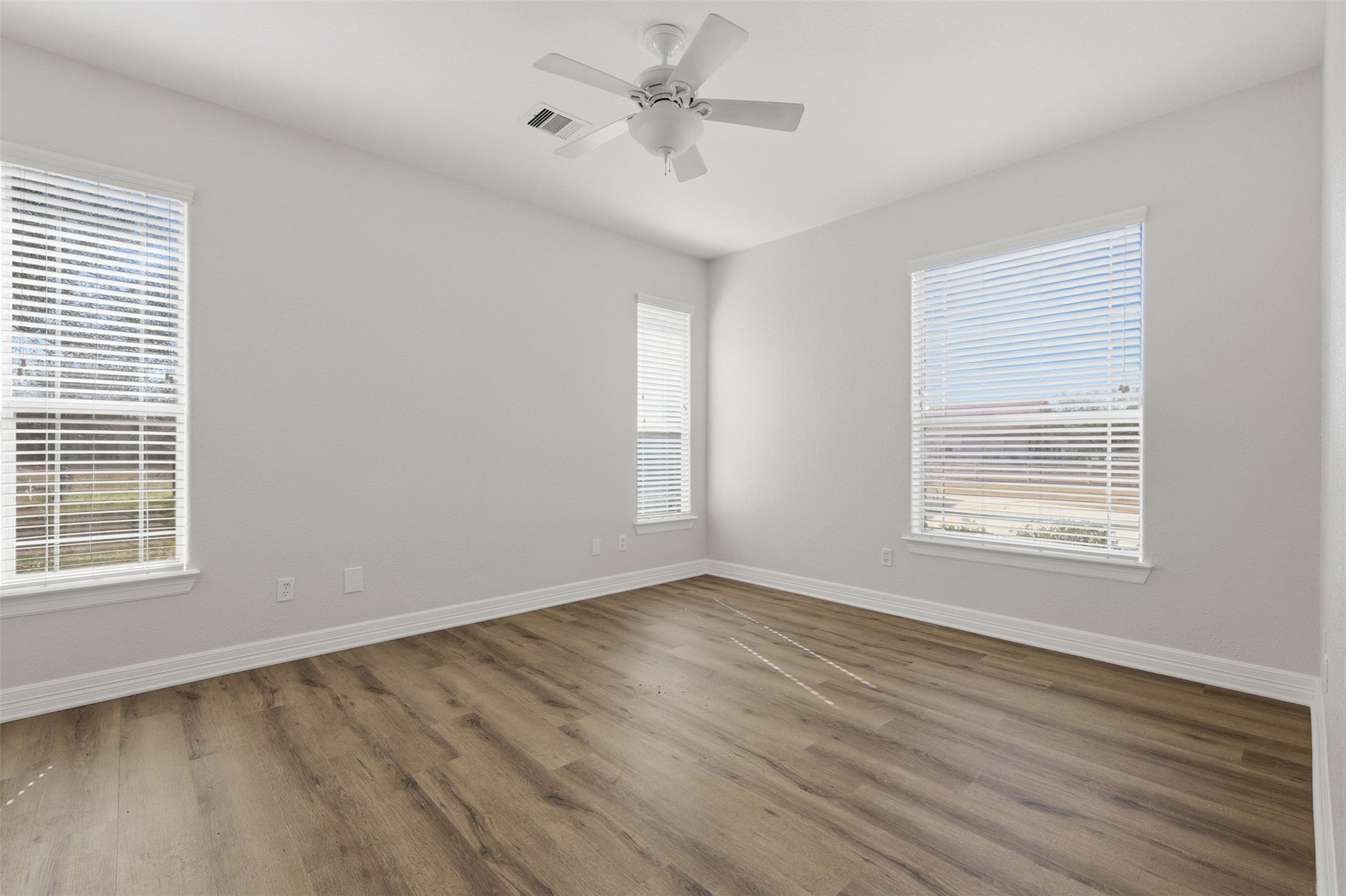 500 Burwell Road Highlands, TX 77562 - Photo 37 of 50 a view of an empty room with wooden floor and a window