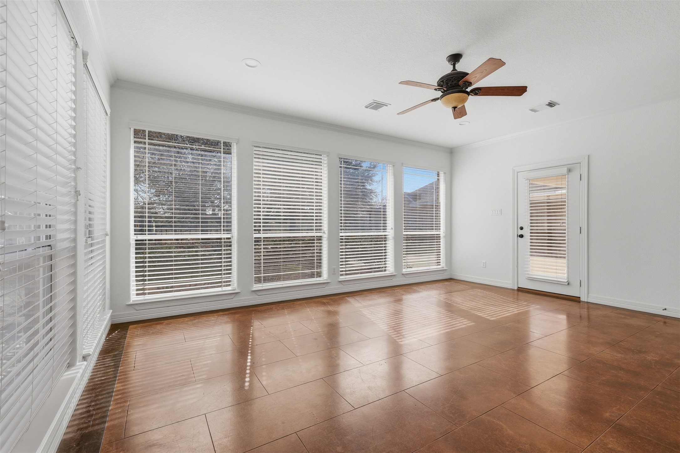 500 Burwell Road Highlands, TX 77562 - Photo 10 of 50 a view of an empty room with a window and wooden floor