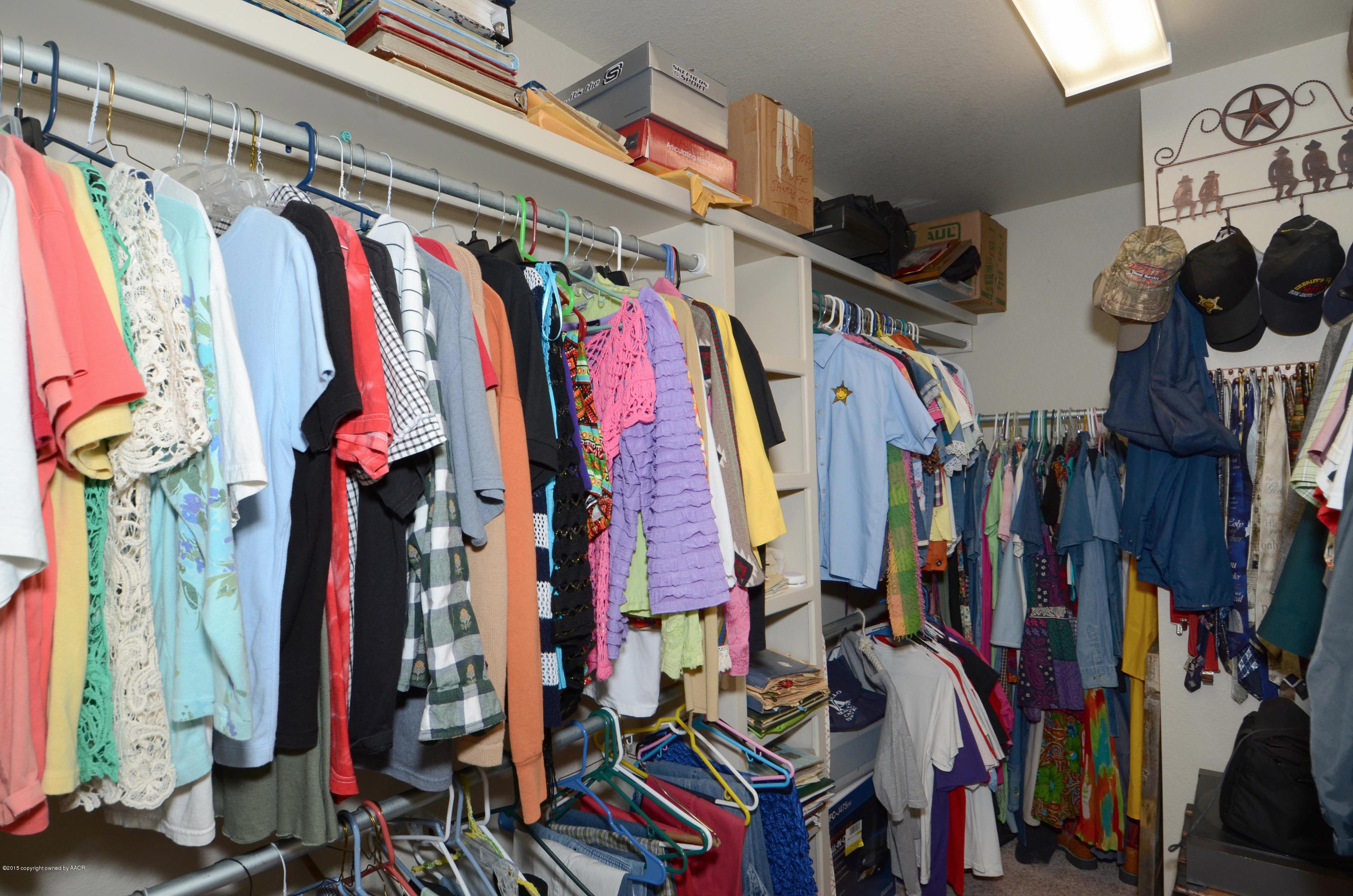 3705 Arden Road Amarillo, TX 79118 - Photo 18 of 20 a view of walk in closet with clothes