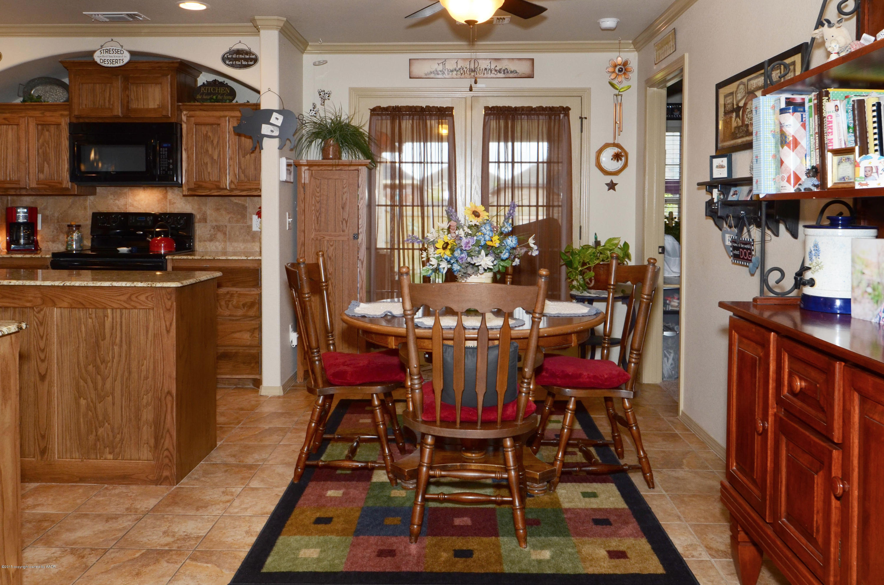3705 Arden Road Amarillo, TX 79118 - Photo 6 of 20 a view of a dining room with furniture