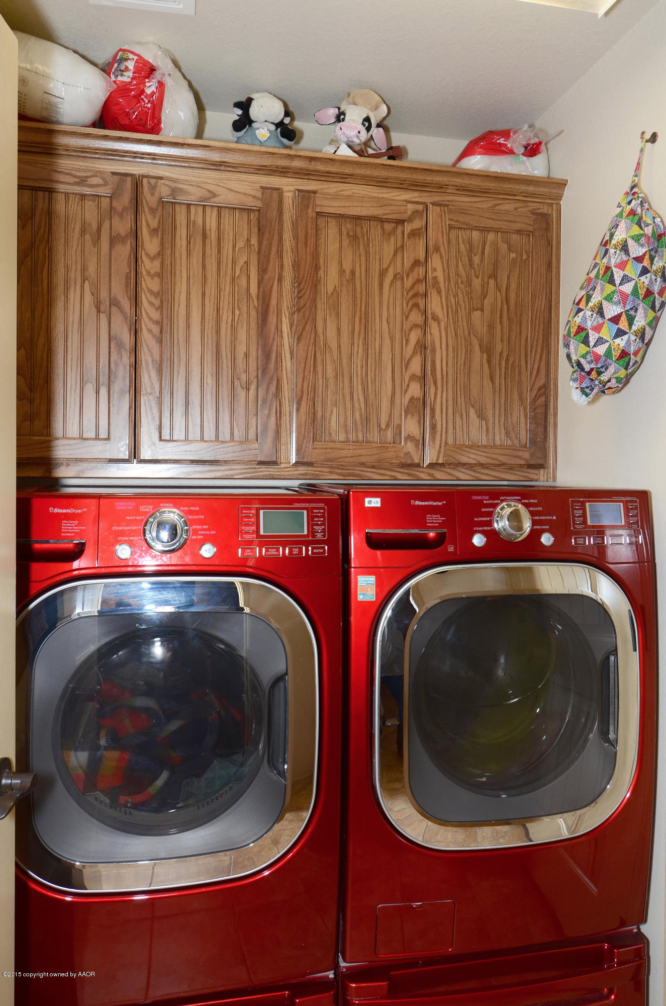 3705 Arden Road Amarillo, TX 79118 - Photo 8 of 20 a utility room with wooden walls