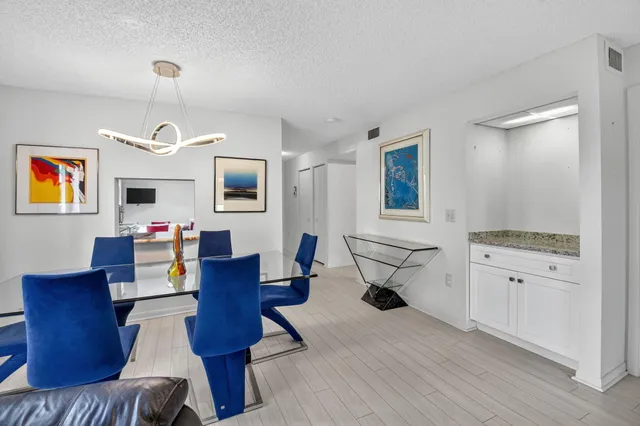 a bathroom with a double vanity sink and mirror