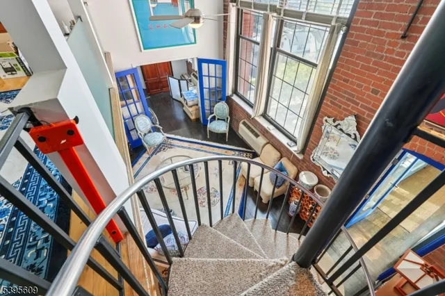 a bed room with a bed and a television