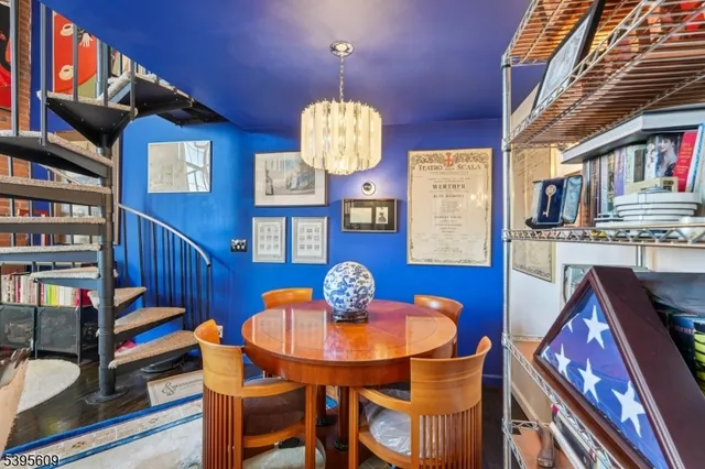 a kitchen with stainless steel appliances granite countertop a sink and a stove