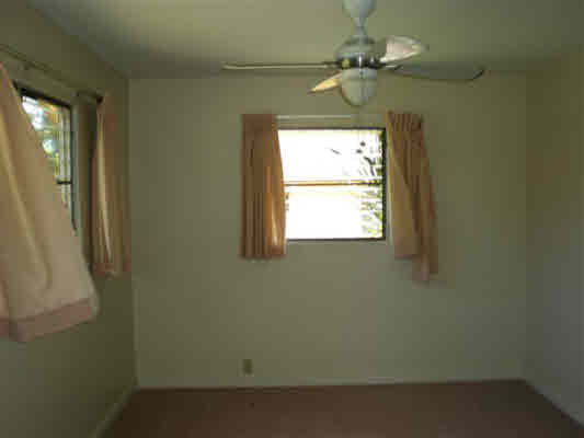 4910 Aliali Road Kapaa, HI 96746 - Photo 12 of 19 an empty room with a window