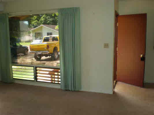 4910 Aliali Road Kapaa, HI 96746 - Photo 6 of 19 an empty room with a fireplace