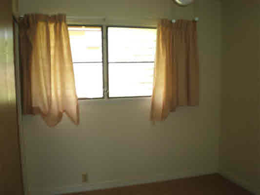 4910 Aliali Road Kapaa, HI 96746 - Photo 10 of 19 a view of an empty room with a window