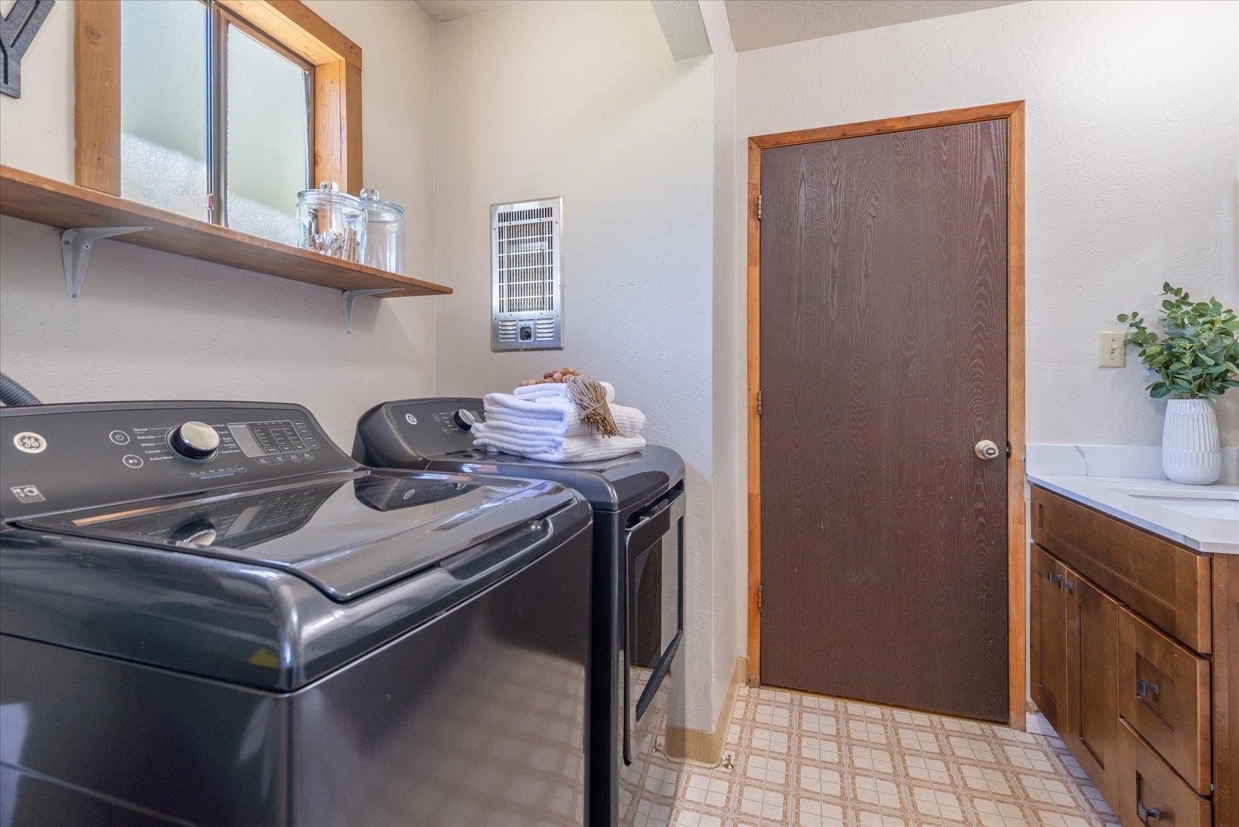325 North Ridge Road Carnelian Bay, CA 96140 - Photo 21 of 22 a utility room with dryer and washer