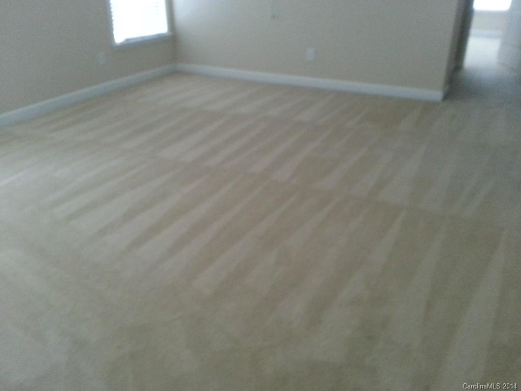 11020 Greenhead View Road Charlotte, NC 28262 - Photo 3 of 18 a view of an empty room and window