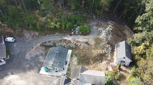 134 Nashville Road Bethel, CT 06801 - Photo 19 of 36 an aerial view of a house with a yard and trees