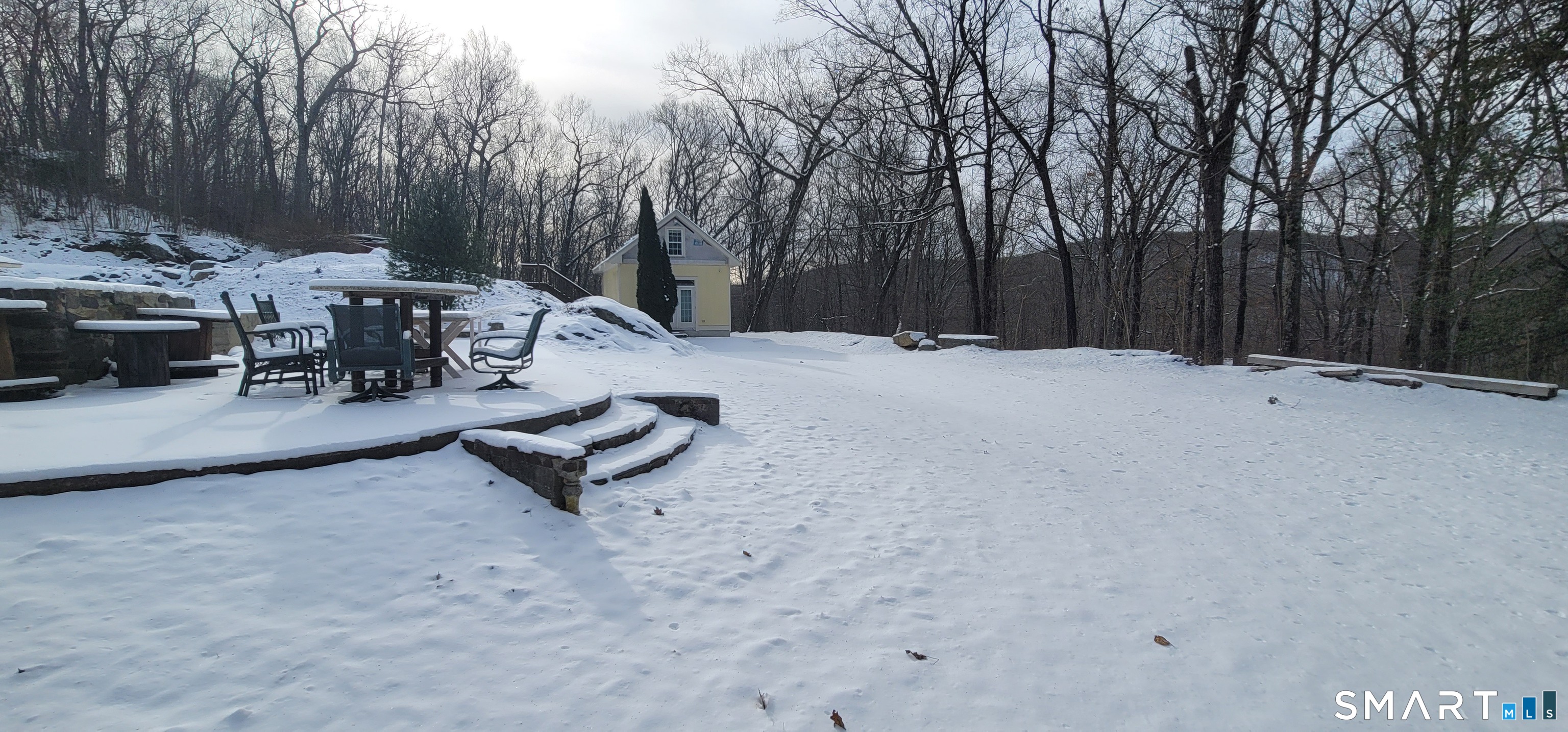 134 Nashville Road Bethel, CT 06801 - Photo 32 of 36 a view of a backyard with sitting area
