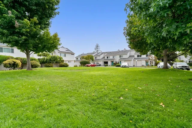 a view of a house with a big yard