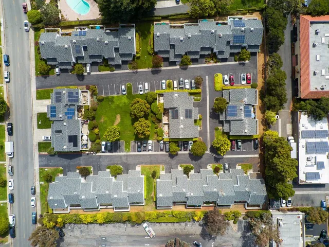 an aerial view of houses and outdoor space