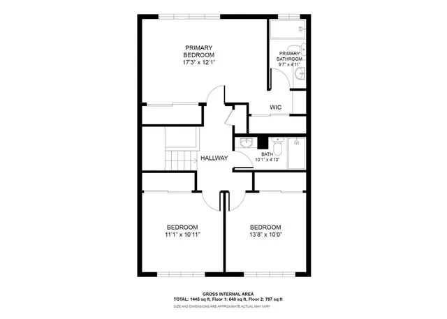 a picture of a bench in front of a wall