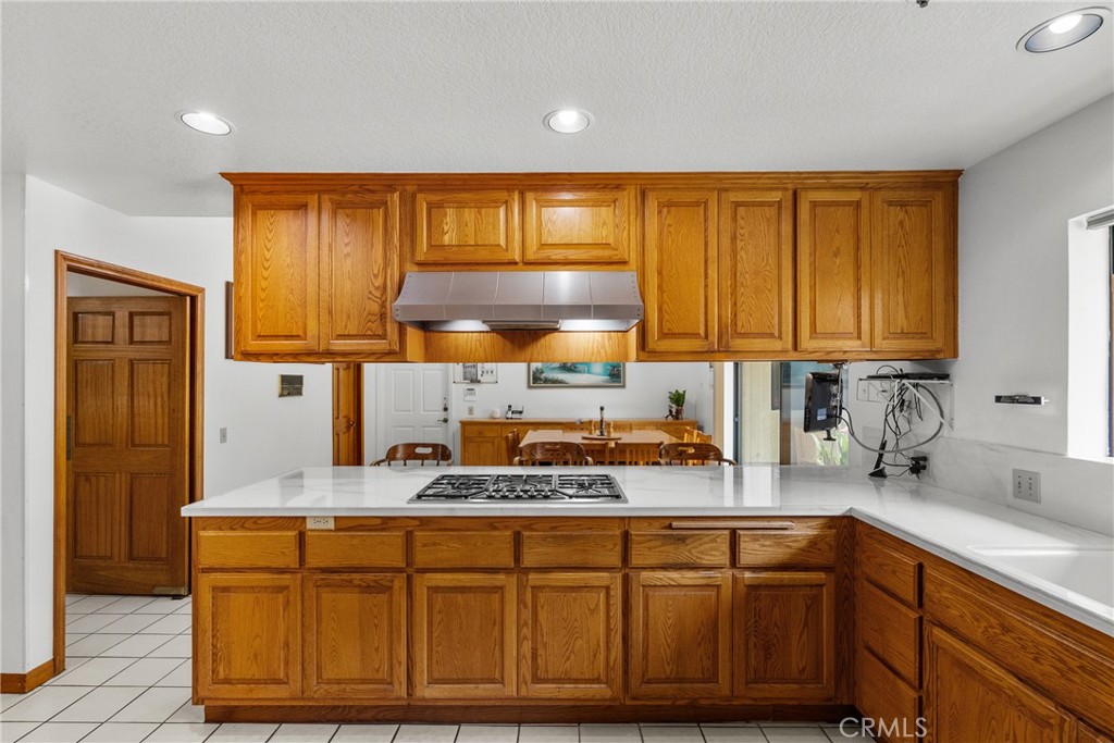 52 Hidden Valley Road Monrovia, CA 91016 - Photo 22 of 55 a kitchen with stainless steel appliances granite countertop wooden cabinets a sink and dishwasher