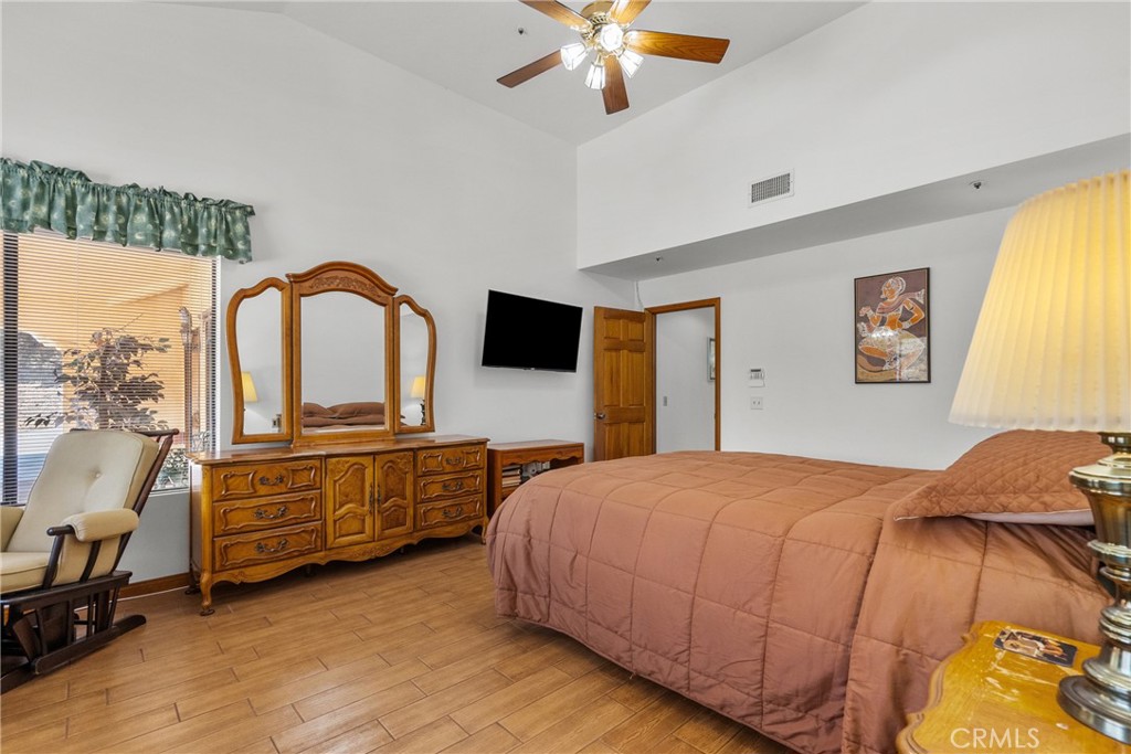 52 Hidden Valley Road Monrovia, CA 91016 - Photo 33 of 55 a bedroom with a bed and a large window