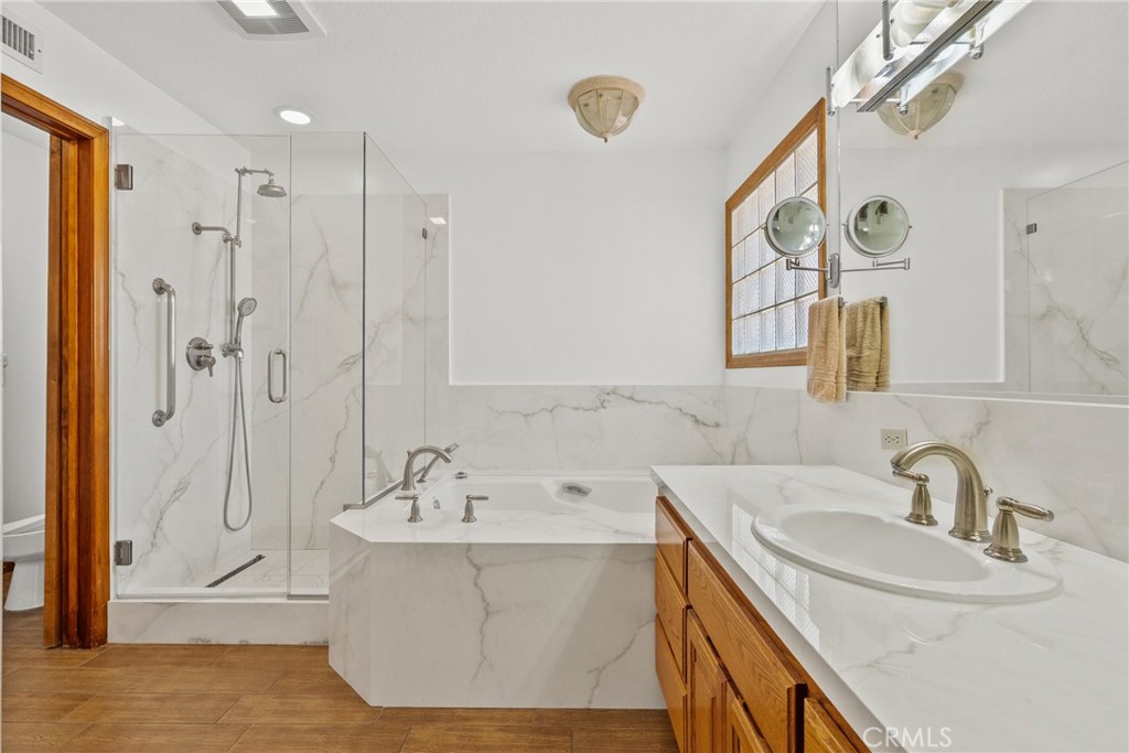 52 Hidden Valley Road Monrovia, CA 91016 - Photo 36 of 55 a bathroom with a sink and a mirror
