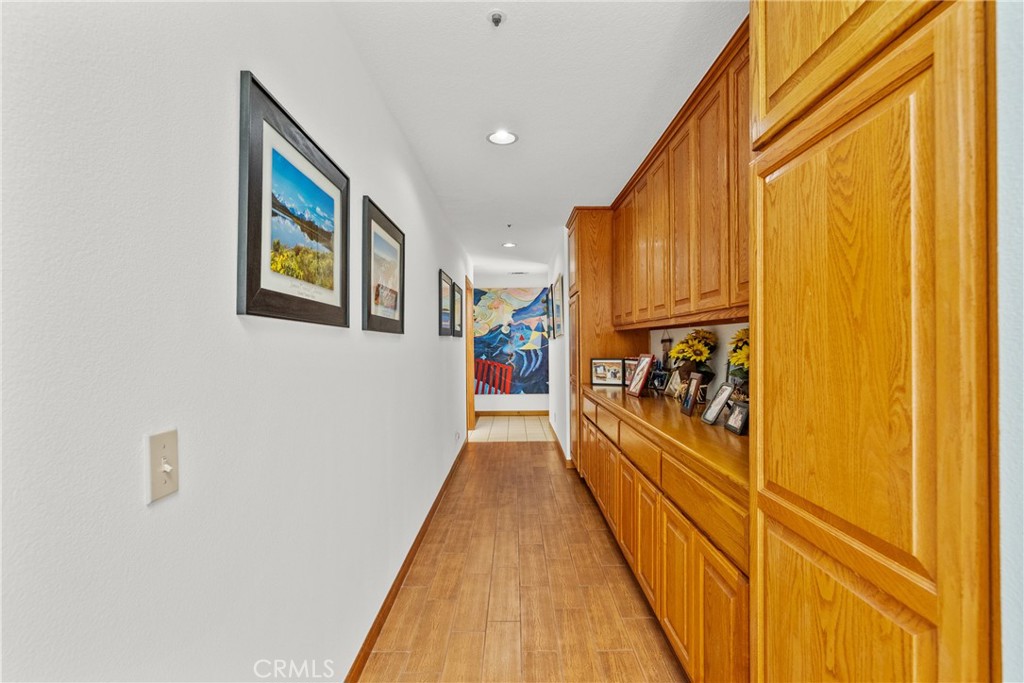 52 Hidden Valley Road Monrovia, CA 91016 - Photo 40 of 55 a view of a hallway with wooden floor and staircase