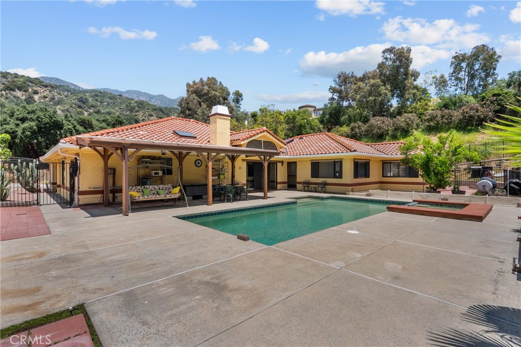 52 Hidden Valley Road Monrovia, CA 91016 - Photo 46 of 55 a front view of house with yard and trees