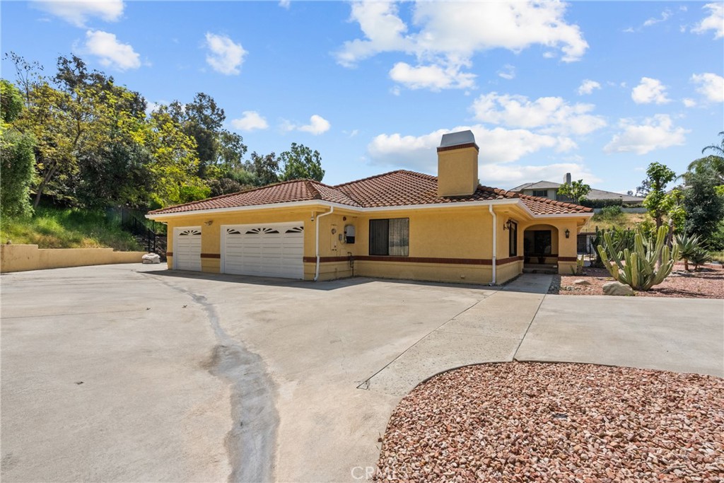 52 Hidden Valley Road Monrovia, CA 91016 - Photo 5 of 55 a front view of a house with a yard