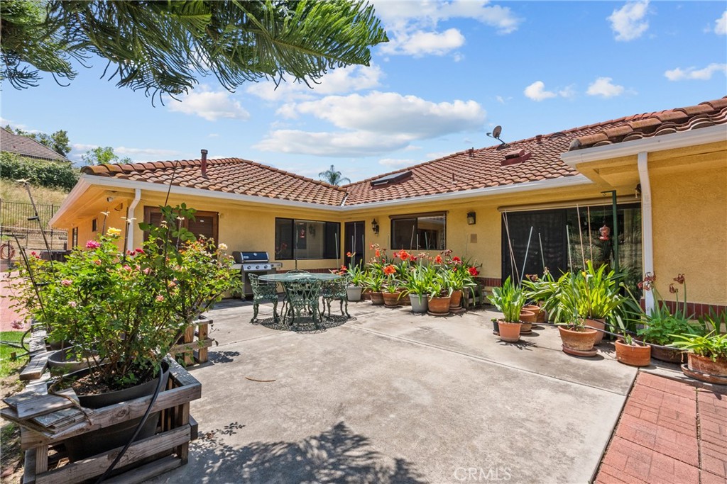 52 Hidden Valley Road Monrovia, CA 91016 - Photo 54 of 55 a view of a house with sitting area and garden